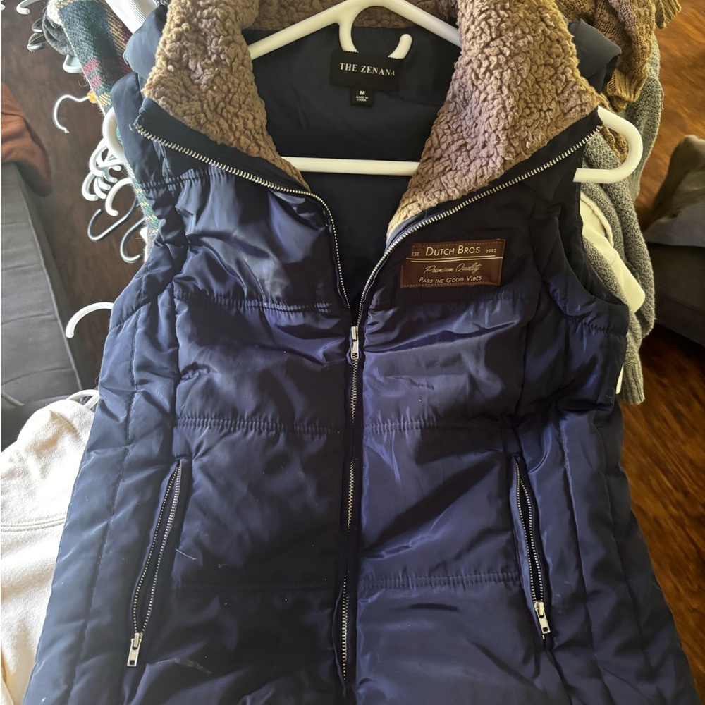 The Zenana Navy Puffer Vest with Brown Sherpa Collar